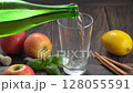 Enjoy crisp flavor of freshly poured apple cider perfect for cozy evening. 128055591