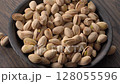 Fresh roasted pistachios ready for savory snack. 128055596