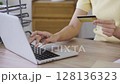 Woman hold credit card and typing information on laptop. payment online concept 128136323