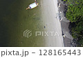 Aerial views of coast line under the sky 128165443