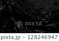 Rich black liquid texture background depicting flowing waves of crude oil. Evokes themes of industry, energy and raw natural resources. Ideal for energy sector and environmental projects. 128246947