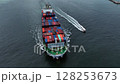 Aerial view from drone, Container ship or cargo shipping business logistic import and export freight transportation by container ship in open sea, Container loading cargo freight ship boat. 128253673