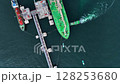 Aerial view crude oil tanker ship and tugboat, Global business import export freight shipping crude oil logistic transport international, Crude oil tanker ship industrial sea freight logistic maritime 128253680