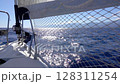 Sun Path on Water and Shadow from Sail. Slow Motion 128311254