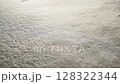 White snow falling shine background texture at night moon light 128322344