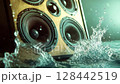 Sound waves create splashes as water hits wooden speakers in a creative water-themed music setting 128442519