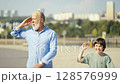 Joyful and Heartwarming Moments Shared Between Grandfather and Grandson in the Great Outdoors 128576999