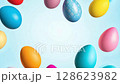 Easter background,Easter eggs on a light blue background and the inscription Happy Easter at the end of the video 128623982