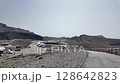 March 25 2025 Scenic volcanic route with crater and mountain views 128642823