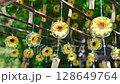 A summer scene in Japan with sunflower wind chimes swaying 128649764