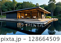 Modern house on a lake with a forest in the background. concept of ecological house keeping and luxury real estate, nature retreats, sustainable living, and tranquil, harmonious lifestyle. 128664509