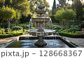 ornamental fountain cascading in a manicured garden 128668367
