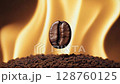 Roasting coffee bean suspended over flames with intense heat and aroma 128760125