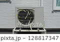Air conditioner outdoor unit in operation 128817347