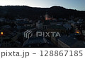 Drone flying over the narrow streets of the beautiful Banska Stiavnica town, 4k 128867185