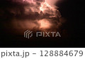 Slow motion video of thunder, lightning, and lightning 128884679