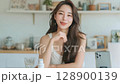 Influencer filming a video 128900139