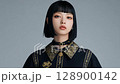 A young woman with a cool look 128900142