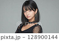 A young woman with a cool look 128900144