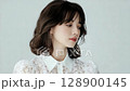 A young woman with a cool look 128900145