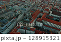 Aerial Flyover of Typical Vienna Rooftops Near Historic City and Stephansplatz 128915321