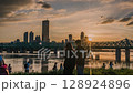High-rise buildings in Yeouido, financial district, Seoul, Korea, and night view of the Han River Bridge city during the summer sunset time. Day to night 4k timelapse cityscape 128924896