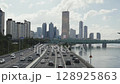 High-rise buildings and cars on the motorway in Yeouido, Seoul's financial district, taken during the summer day 128925863