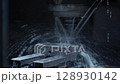 High-speed CNC milling machine in operation with coolant spraying over metal part in dark industrial environment. Concept of precision engineering, automated machining, and modern manufacturing 128930142