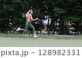 young female athlete running fast, slow motion video of running 128982331