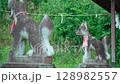 Stone statue of a fox at the Inari Shrine on the mountain 128982557