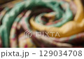 A Beautiful Colorful Textile Fabric CloseUp with Intricate and Detailed Patterns 129034708