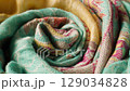 A Beautiful Colorful Textile Fabric CloseUp with Intricate and Detailed Patterns 129034828