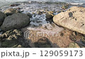sea surf among rocks, close-up, slow motion 129059173