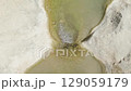 water flows in mountain stream, top view, close-up, slow motion 129059179