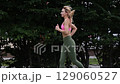 young female athlete running fast, slow motion video of running 129060527