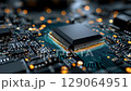 Close-up view of a computer microchip on a circuit board, showcasing intricate connections and glowing elements, representing advanced technology and innovation in electronics 129064951