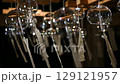 Wind chimes swaying in the wind 129121957
