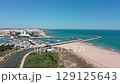 Beautiful vilamoura marina and beach aerial view showing docks, boats, cityscape, and ocean on a sunny day in the algarve region of portugal 129125643