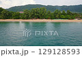 Aerial drone view of Ko Lanta island. Fly near coastline and famous long beach, turquoise water and white sand. Concept of vacation and relax in tropical paradise 129128593