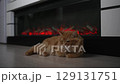 Cat Warming up by the Fireplace 129131751