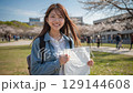 A lovely smiling female college student - AI-generated image 129144608