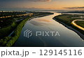 A meandering river delta at dusk 129145116