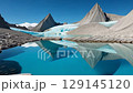 Turquoise glacial lake reflecting the pinnacles 129145120