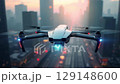 Surveillance Drone Hovering and Panning Over Urban Cityscape at Sunset 4K 129148600
