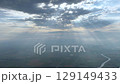 Aerial View: Sun Beams Through Clouds Over Vast Landscape 129149433