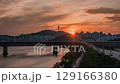 summer sunset 4k timelapse in summer Seoul, South Korea, Namsan Tower, Dongho Bridge, and Han River cityscape 129166380