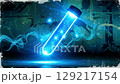 Innovative laboratory experiment showcases glowing test tube filled with luminescent solution 129217154