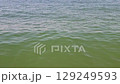 Beautiful water surface of the sea. Mesmerizing ripples on the surface of the water. 129249593