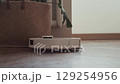 Smart robot performs dual cleaning vacuuming dust first and then mopping the floor for a spotless result. 129254956
