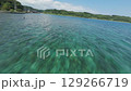An exhilarating FPV shot racing low across the clear shallows of Anamizu's coast in the Sora area. The vivid underwater scenery and traditional seaside homes give a unique sense of place and motion. 129266719